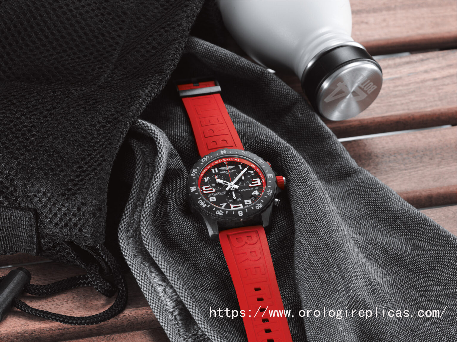 replica03_endurance-pro-with-a-red-inner-bezel-and-rubber-strap-1-1536x1150